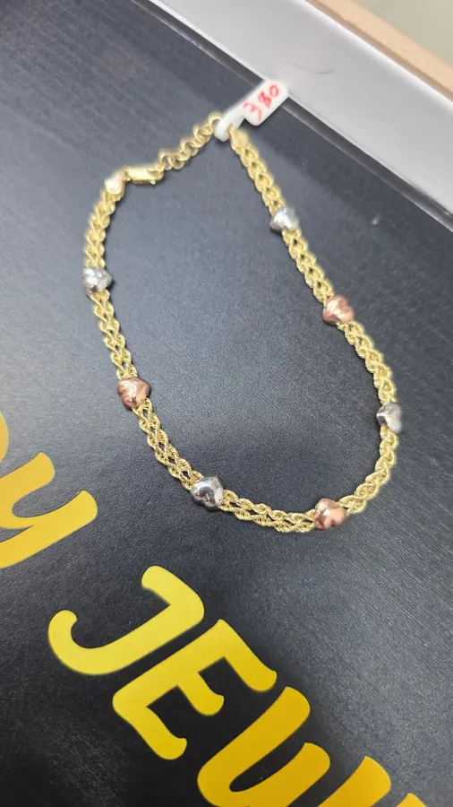 Two-tone hearts bracelet in 10K gold