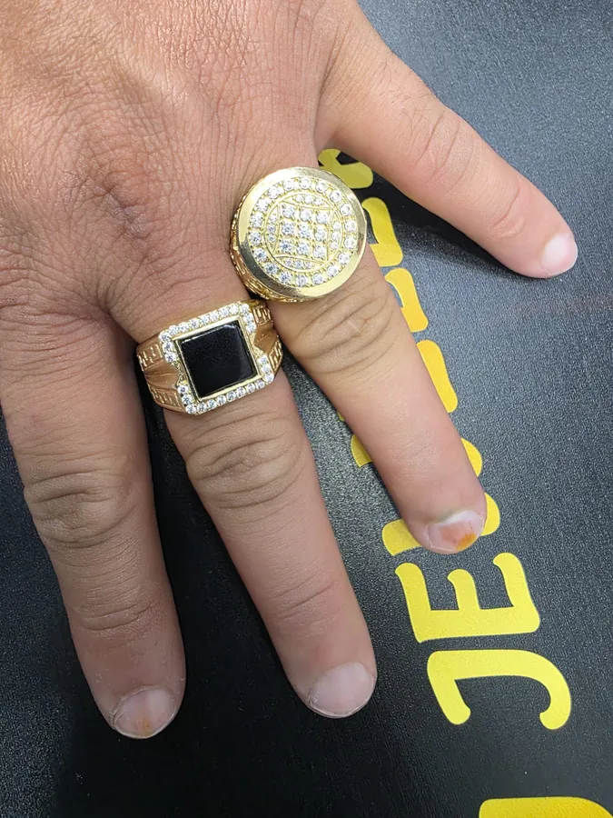 Signet and pavé rings in 10K gold, worn