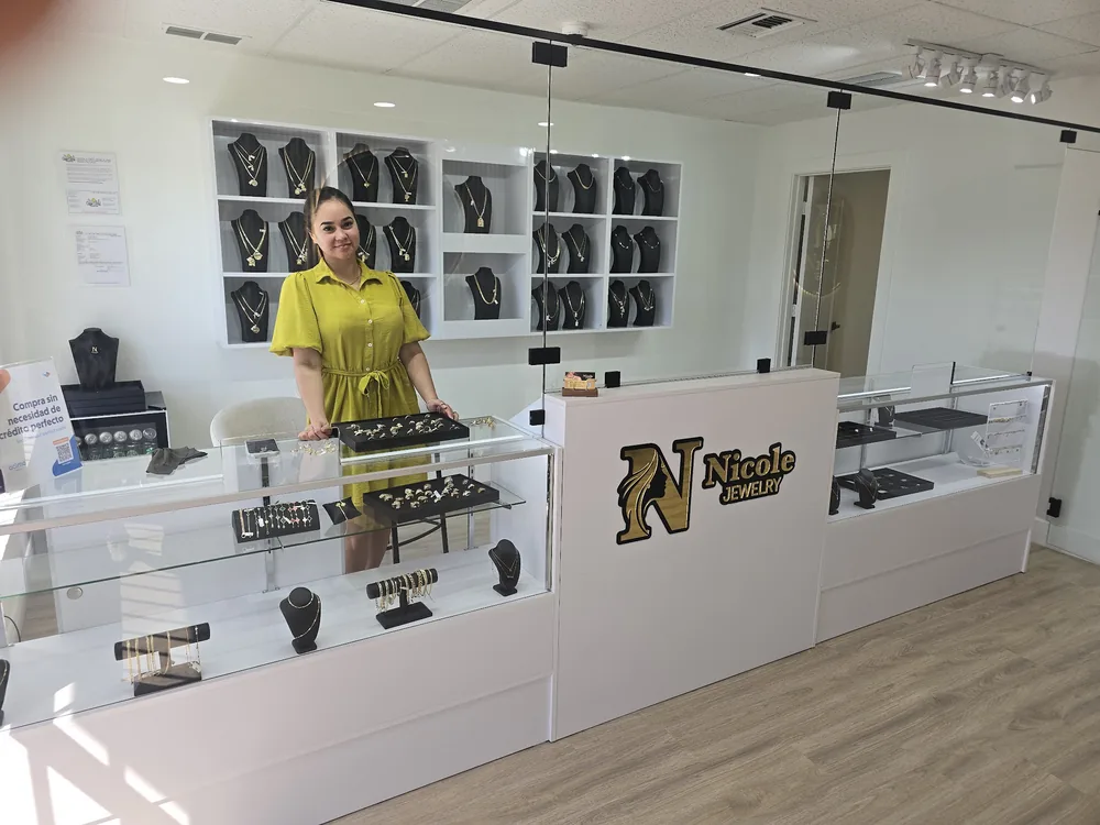 Nicole at the counter of Nicole Jewelry & Gold Store, Cape Coral